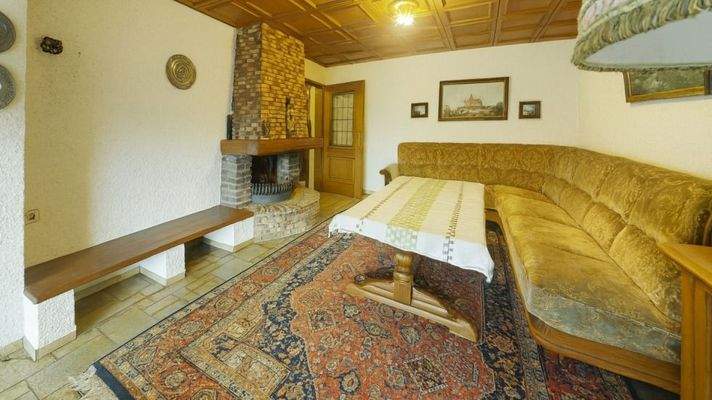 Wohnzimmer EG mit offenem Kamin