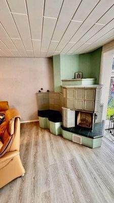 Haupthaus Wohnzimmer Kachelofen