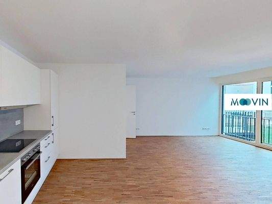 Ansicht II: Wohn- und Esszimmer mit offenem Küchenbereich