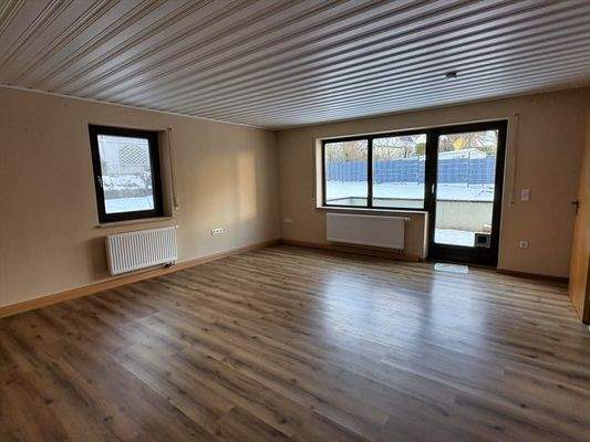 Wohnzimmer mit Gartenzugang