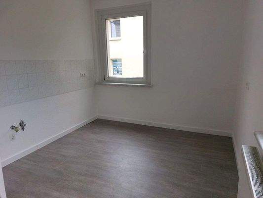 Küche mit Fliesenspiegel