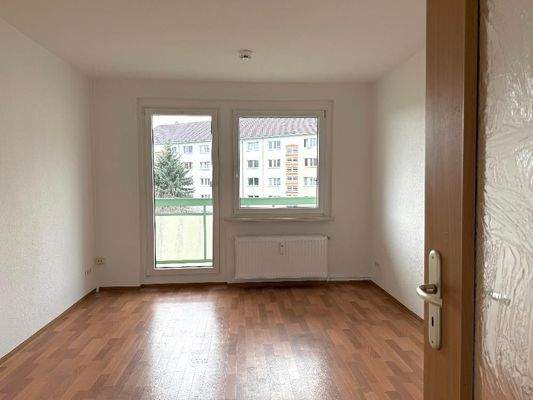 Wohnzimmer mit Balkon