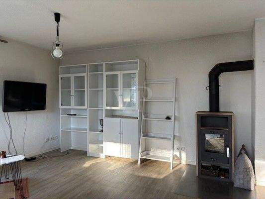 Wohn-/Essbereich mit Kamin