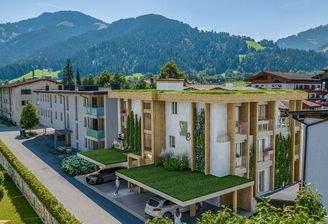 KITZIMMO-Grundstück mit Baugenehmigung für 5 Wohnungen - Immobilien Söll.