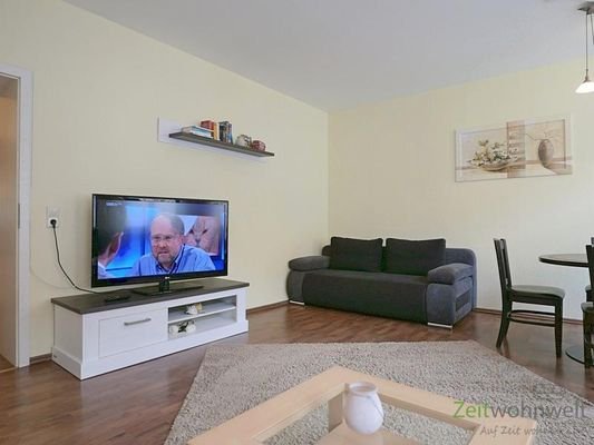 TV und separates Schlafsofa