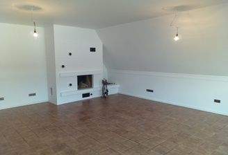 Wohnzimmer mit Kamin