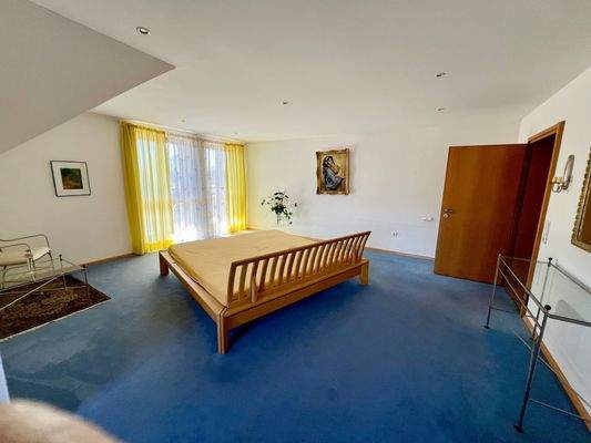 Schlafzimmer mit Balkon