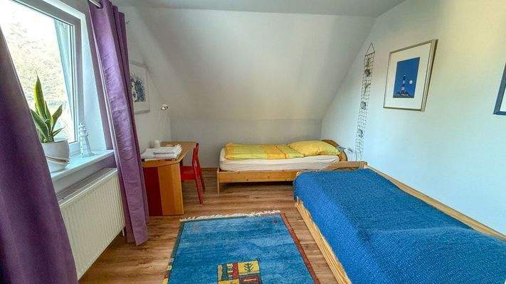 Gästezimmer im Dachgeschoss der Wohnneinheit