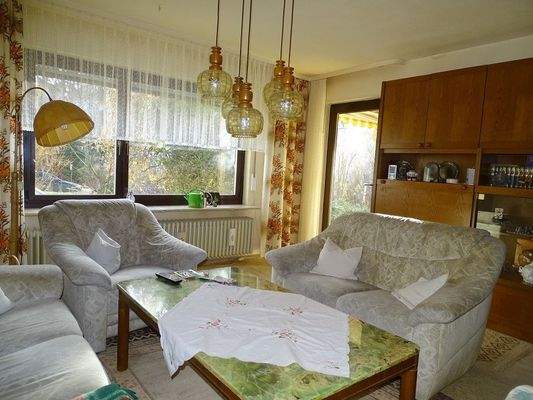 Wohnzimmer mit Zugang zur Terrasse