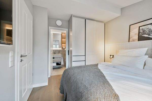 Schlafzimmer I mit Bad en Suite