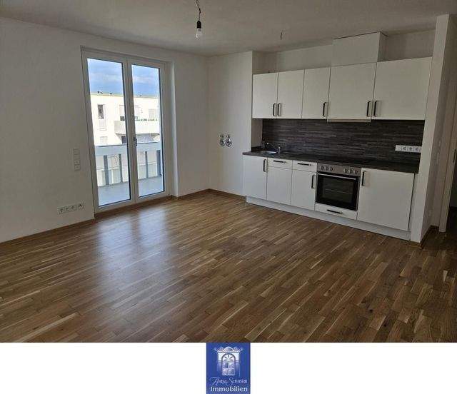 Wohntraum mit schönem Balkon, hochwertiger EBK und exklusivem Bad! - Photo 5