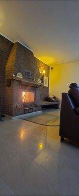 Kamin +gemauerte Bank für Holz