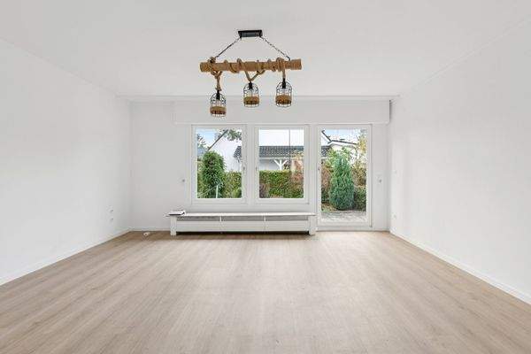 Wohnzimmer mit Ausgang zur Terrasse