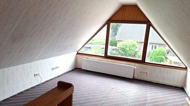 Mansarde mit verglastem Giebel