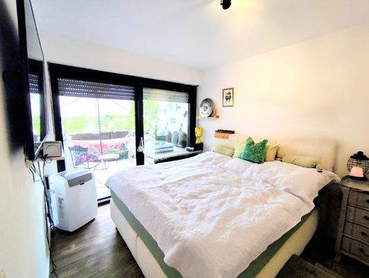 Schlafzimmer mit Balkon
