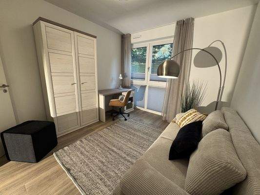 Arbeits-/Gästezimmer im Erdgeschoss