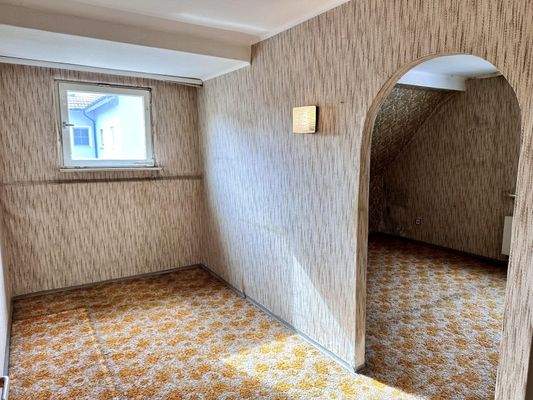Zimmer im Obergeschoss