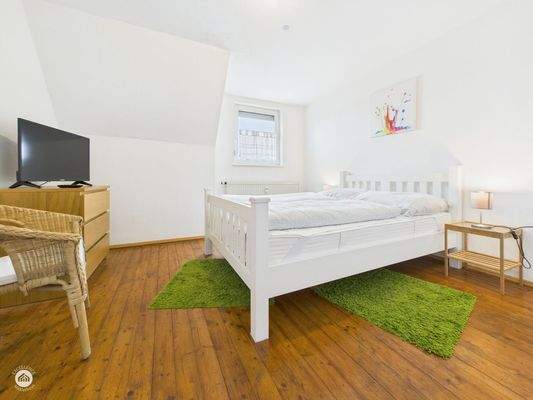 Wohnung 5 - Schlafzimmer 