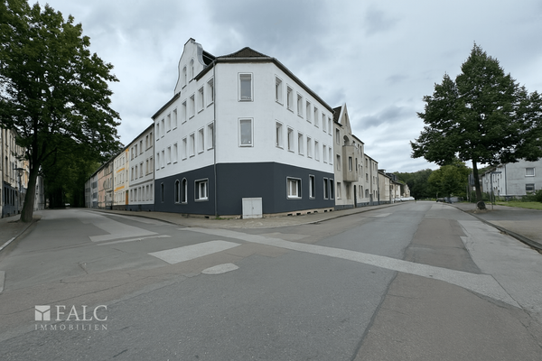 A_photograph_captures_a_daytime_street_scene_at_th