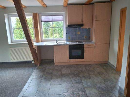 Einbauküche im offenen Wohn-/Essbereich im OG