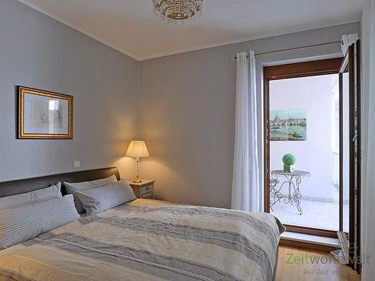 Schlafzimmer mit Balkon