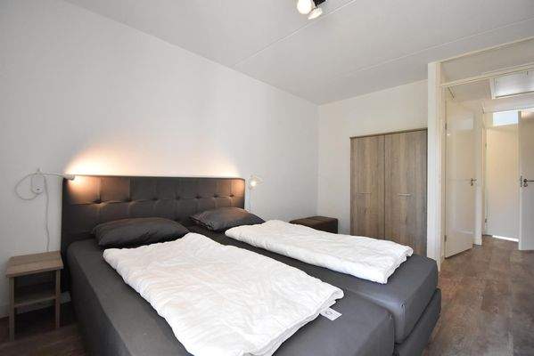 ferienwohnung-schlafzimmer-cap-helius-balcony-zuga