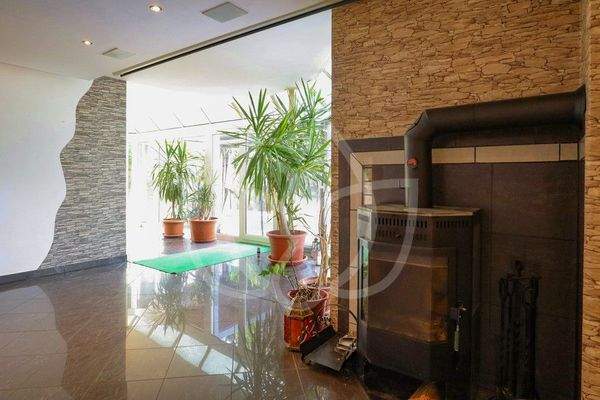 EG - Wohnbereich mit Wintergarten & Kamin