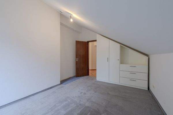 Schlafzimmer mit Balkonzugang