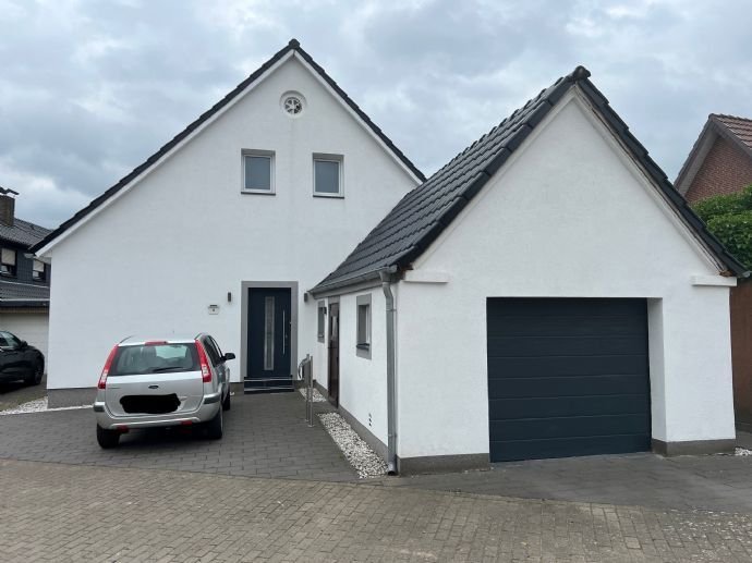 Twistringen! Vermietetes Einfamilienhaus mit Garage in ruhiger Wohnlage!