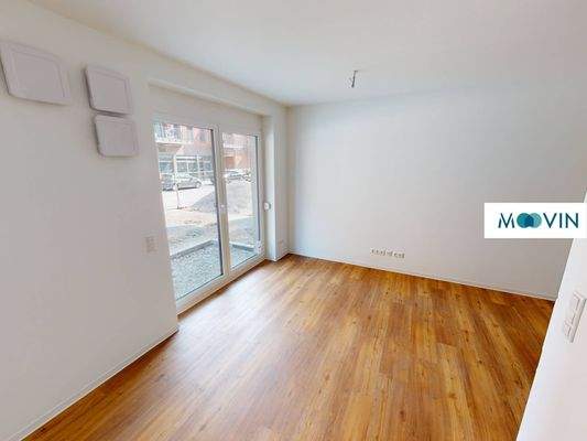 Ansicht IV: Wohn- und Schlafzimmer mit offenem Küchenbereich