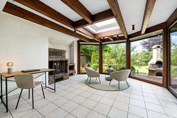 Wintergarten mit Kamin