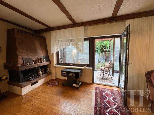 Wohn-Esszimmer mit Kamin