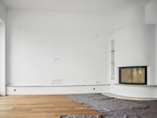 Wohnzimmer mit Kamin