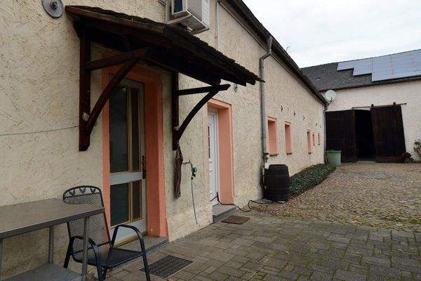 Rückansicht MFH und Zugang Öllager