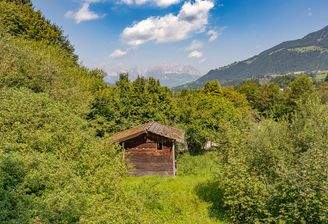 KITZIMMO-Grundstück für Einheimische in sonniger Ruhelage kaufen - Immobilien Kitzbühel.