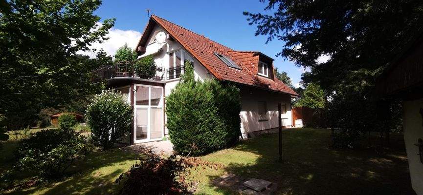 ETW 1-EG hinteres Grundstück m. Wintergarten.jpg