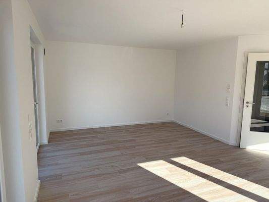 Wohn-/ Essbereich mit Terrasse