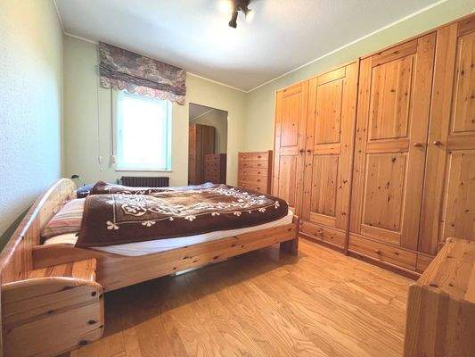 Wohnlichkeit zeigt sich auch im Schlafzimmer