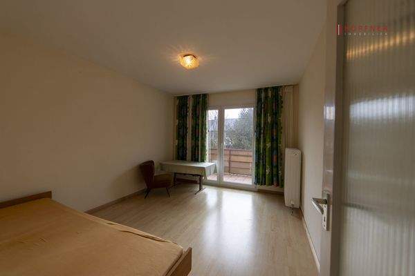 Schlafzimmer mit Balkon