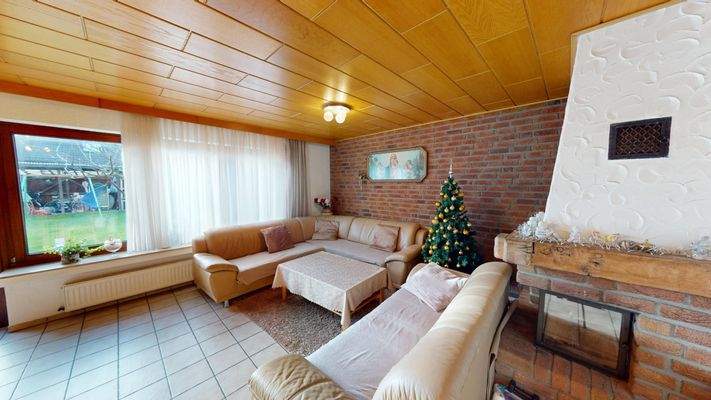 Wohnzimmer mit Kamin