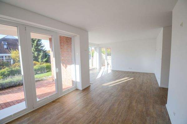 Wohn-/Esszimmer mit Terrassenzugang