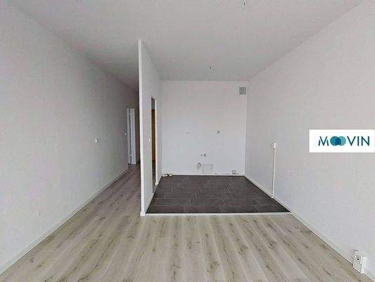 Ansicht III: Wohn- und Esszimmer mit offenem Küchenbereich