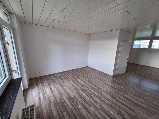 Wohnzimmer mit Esszimmer