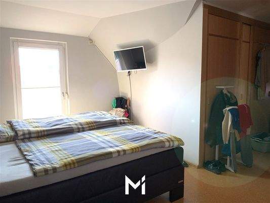 Elternschlafzimmer Dachgeschoss mit Balkon