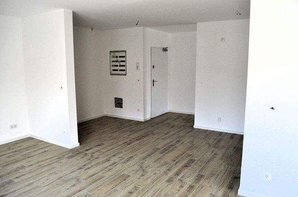 Wohnzimmer in Richtung Wohnungseingang.JPG