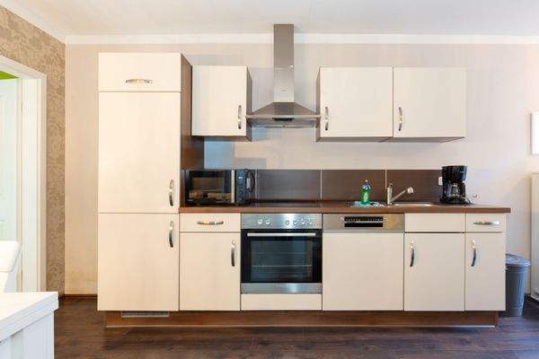 Die vollausgestattete Einbauküche