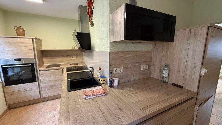 Küche mit Einbauküche