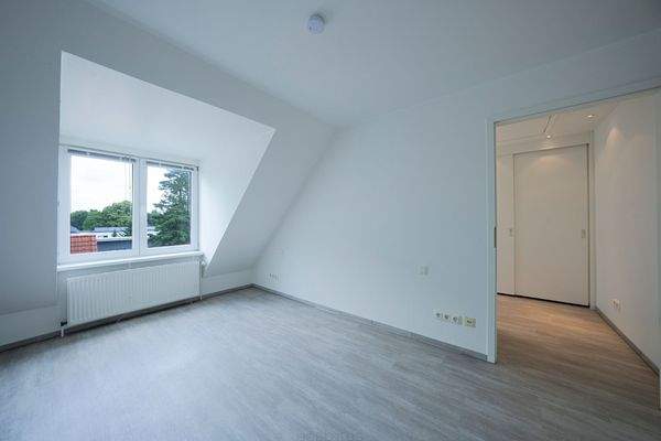 Schlafzimmer in der oberen Etagemit Zugang zur Ankleide