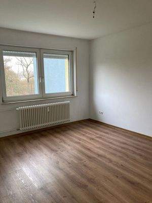 Beispielbild: Schlafzimmer mit PVC-Boden in Holzoptik 