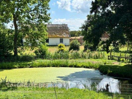 Dorfteich und hinter der Haffbergstraße das Wohnha